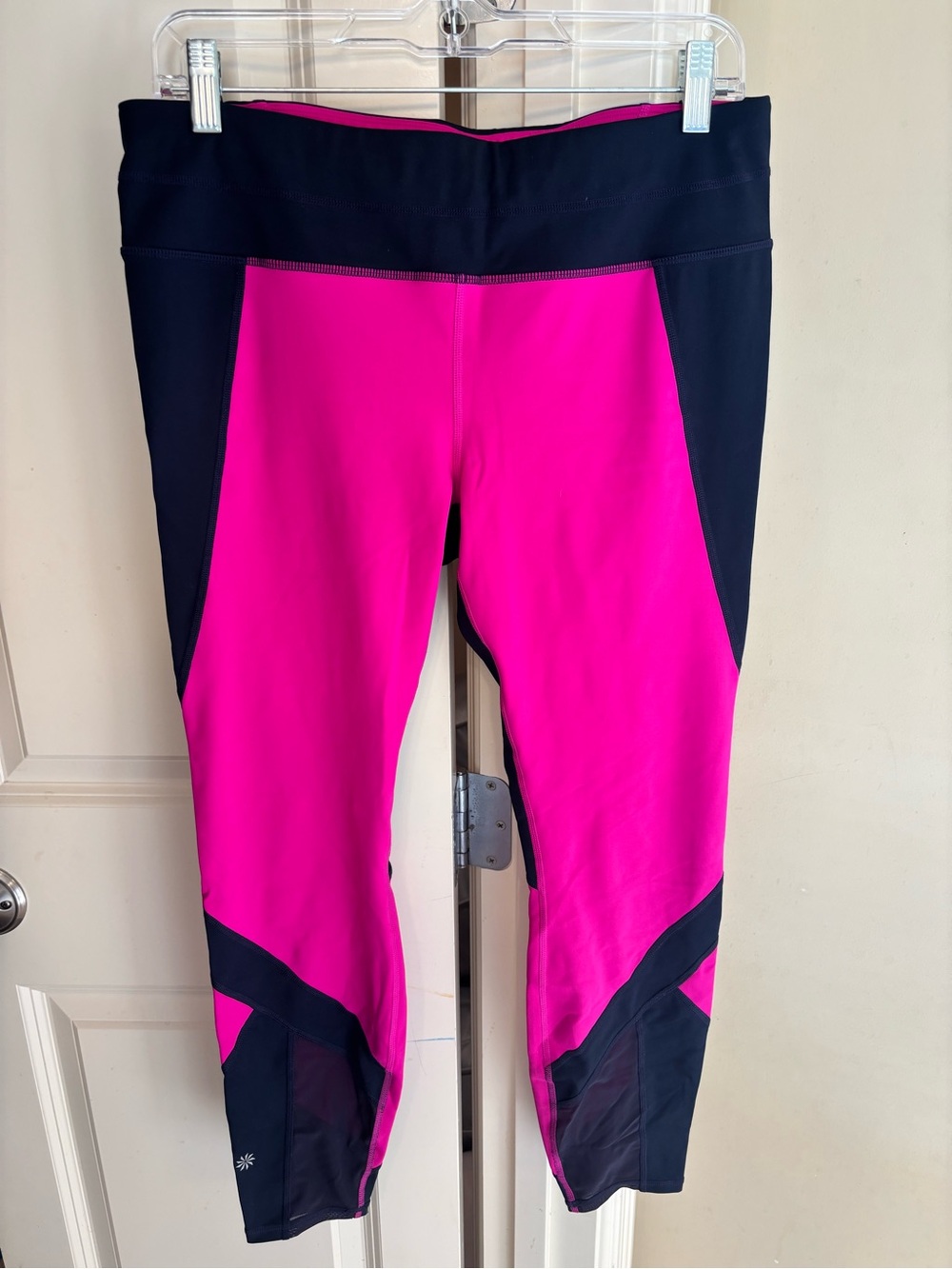Athleta women’s  Pink and midnight Colorblock Leggings with mesh bottom panel